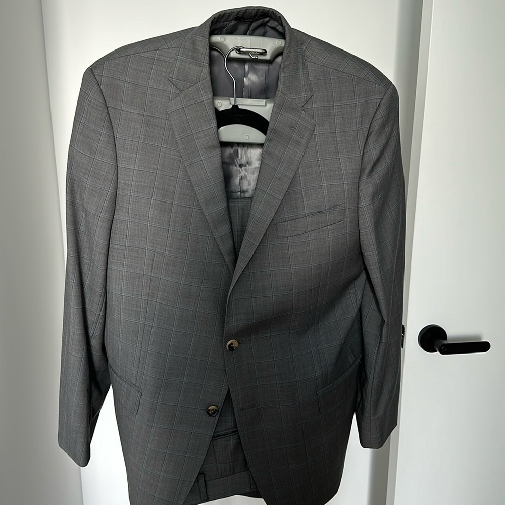 Barley worn Hart Schaffer Marx two button grey and light blue plaid suit